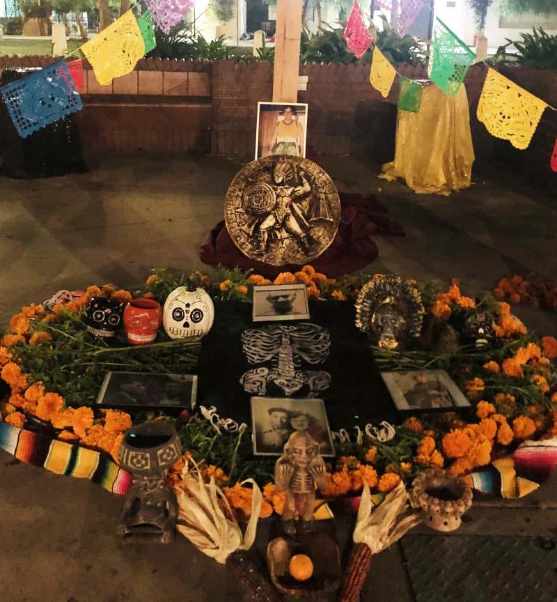 Dr. Mathew Sandoval built this ofrenda, or altar, for his grandfather in 2022. 坛上 was installed at the Placita Olvera in an historic area of downtown Los Angeles for the annual Día de los Muertos festival. (Photo courtesy of Mathew Sandoval)